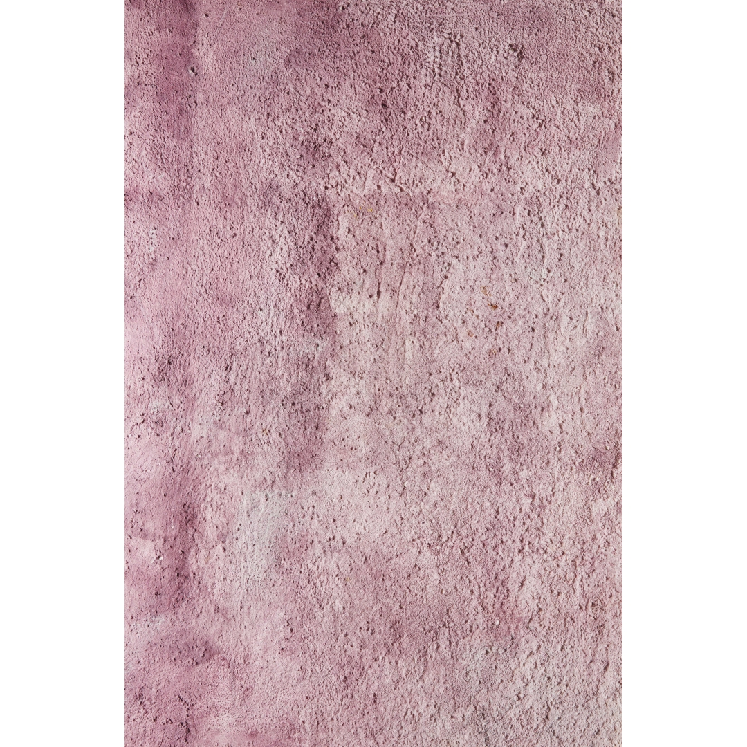 Fondo rosa texturizado con relieve irregular y acabado mate en tono rosa empolvado