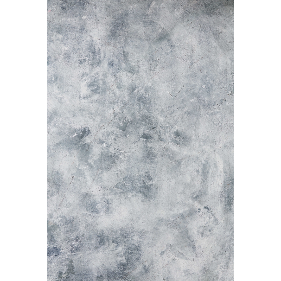 Fondo gris azulado claro con textura suave y acabado mate de aspecto mineral difuso