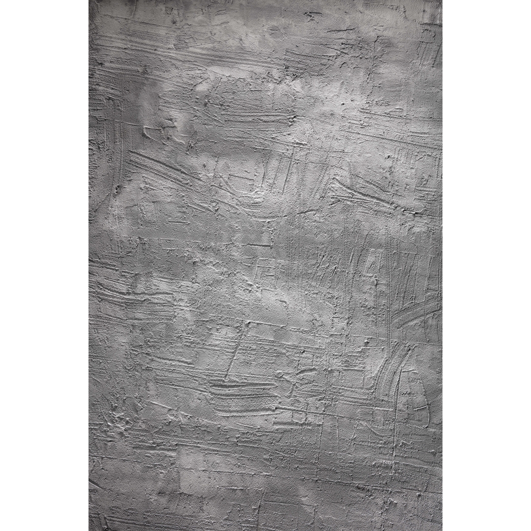 Fondo gris texturizado con relieve marcado y acabado mate de aspecto mural e industrial