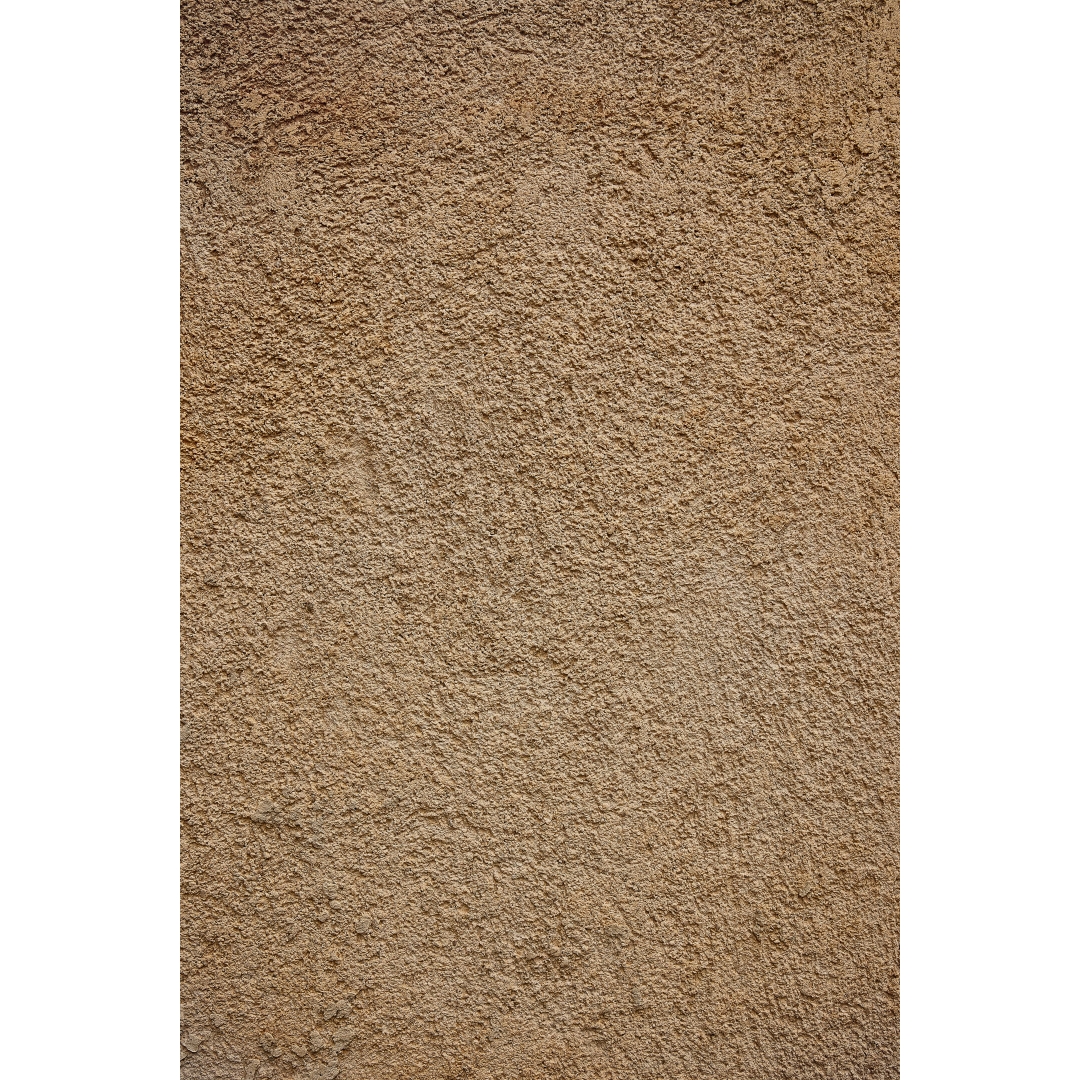 Fondo arena texturizado en tono beige cálido con acabado mate y superficie irregular
